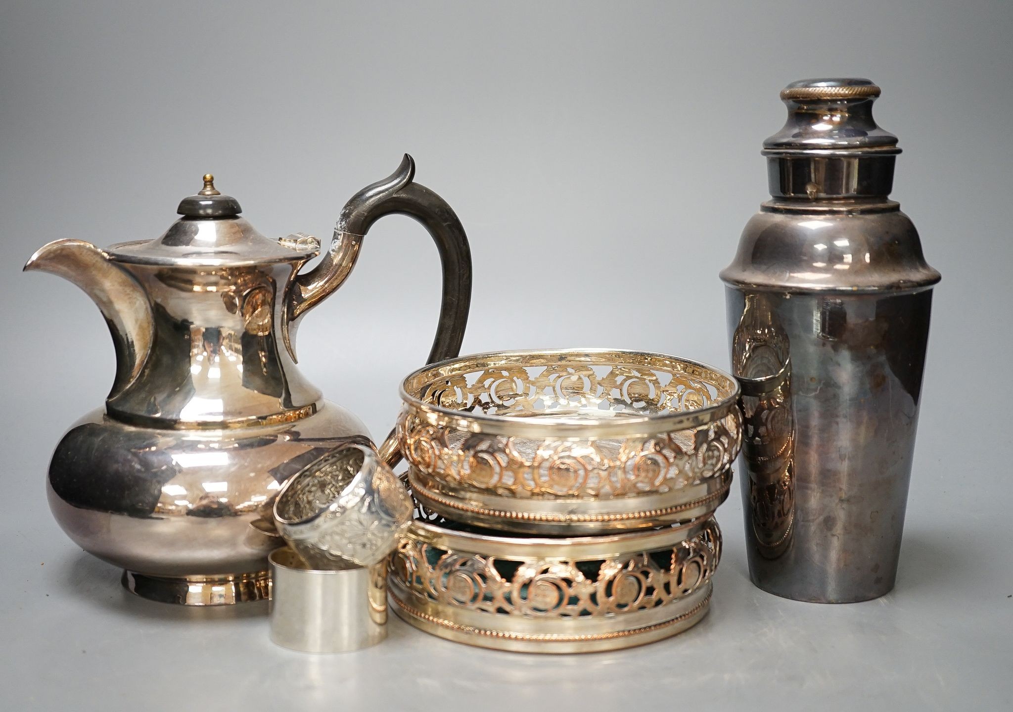 A silver plated rifle shooting cup , a cocktail shaker and mixed plate